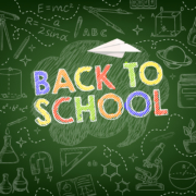 Slogan "Back to school" in bunten Kreidefarben auf grünem Tafelhintergrund mit kleinen Symbolen